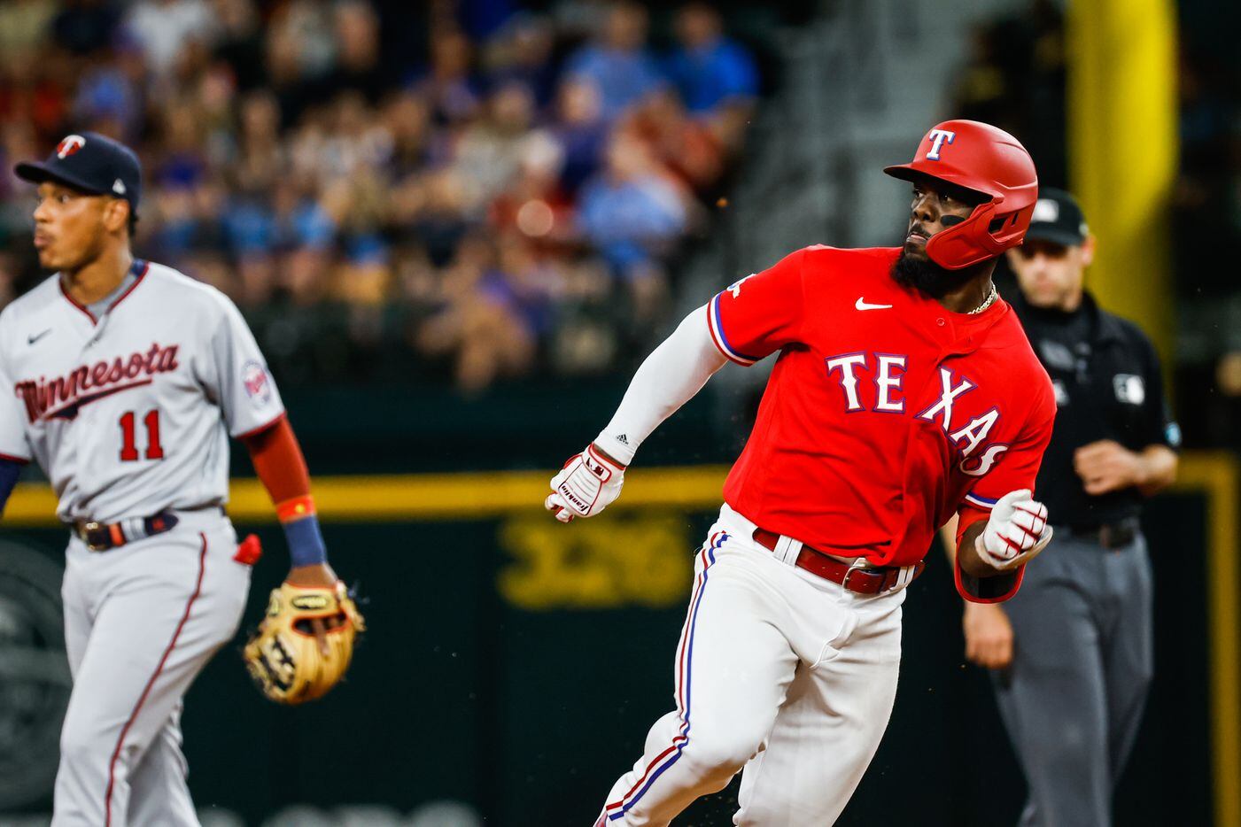 Texas Rangers right fielder Adolis Garcia (53) passes second base during a game against...