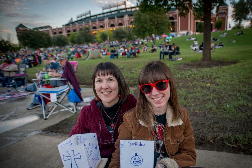 Tracie Matthews, left, and daughter Jordan Matthews with the water lanterns they prepared...