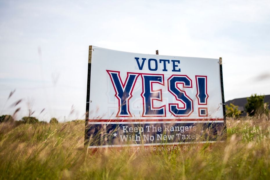 Pro-New Rangers Stadium signs stands on the Arlington Municipal Airport grounds. on Oct. 13,...