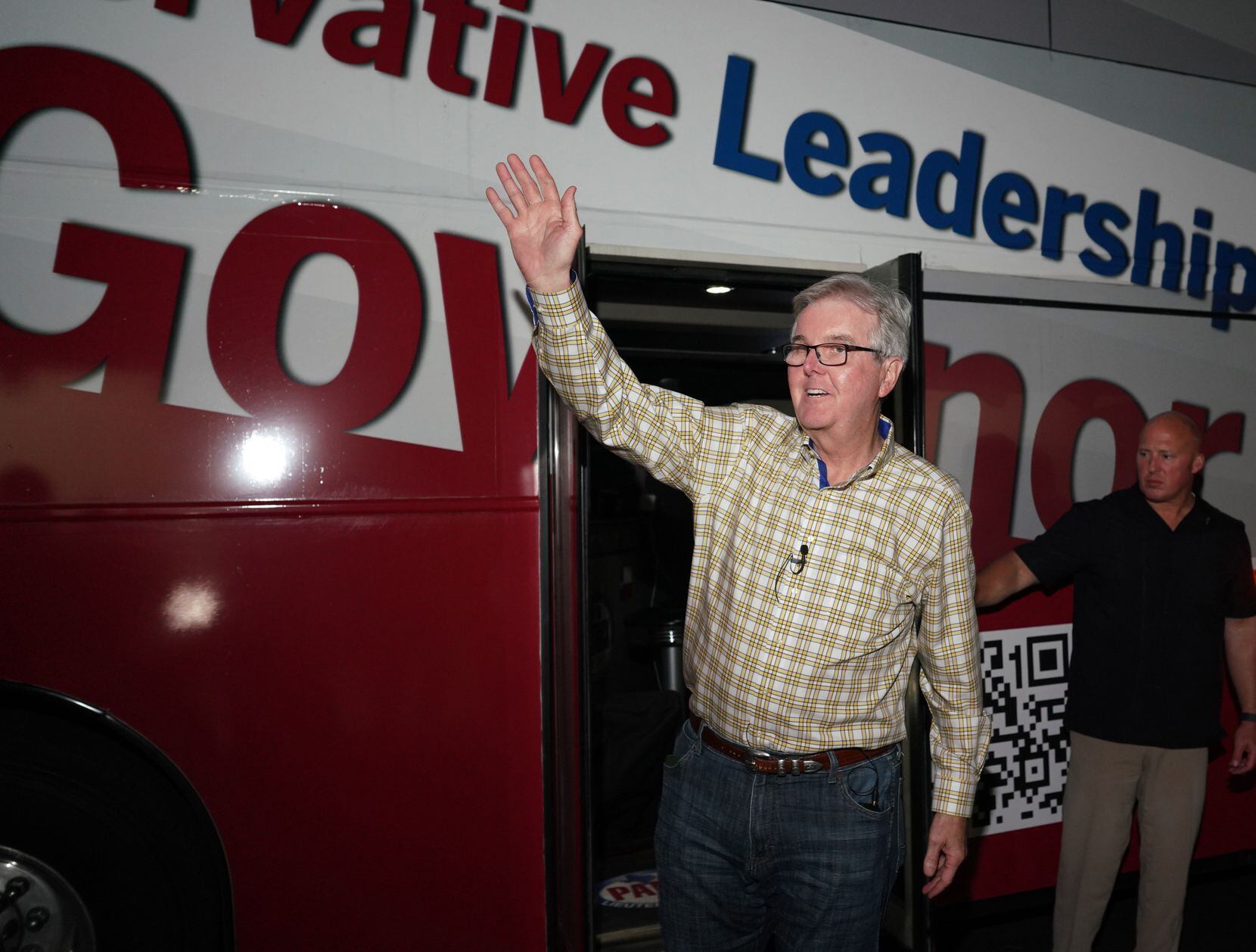 Texas Lt. Governor Dan Patrick waved at supporters as he walked off his campaign bus at the...