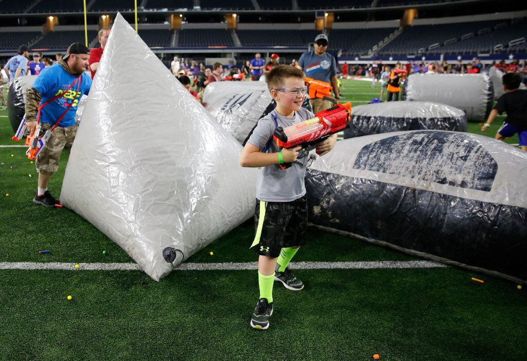 Parker Pence, 8, competes during Jared's Epic Nerf Battle 2 at AT&T Stadium in Arlington,...