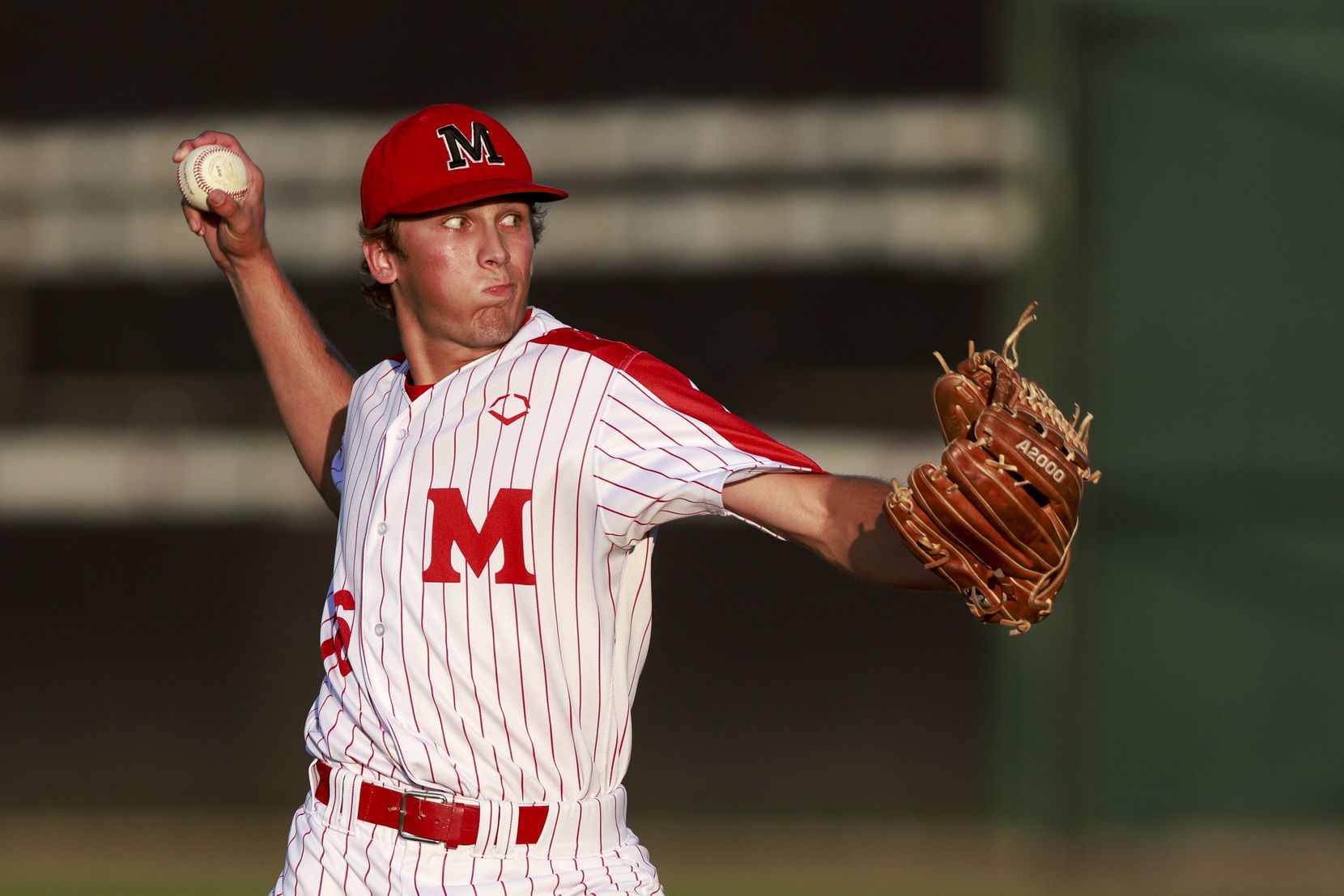 Flower Mound Marcus starting pitcher Tate Evans (16) delivers a pitch in the first inning of...