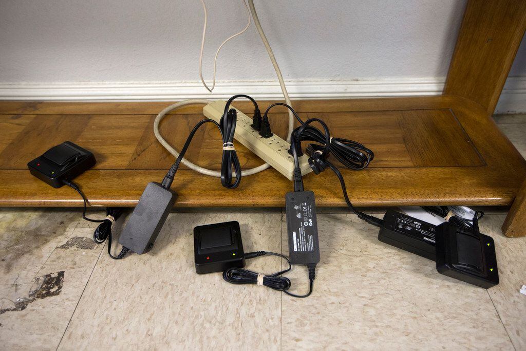 Batteries for ankle monitors charge at the Humanitarian Respite Center in McAllen, Texas on...