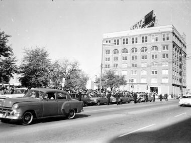 November 23, 1963 - Crowds along Houston Street waiting to see Lee Harvey Oswald transferred...