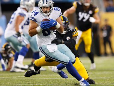 Dallas Cowboys tight end Sean McKeon (84) makes a pass completion during the first quarter...