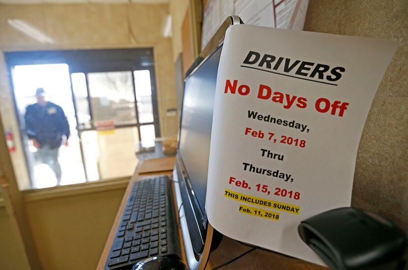 A note for drivers is attached to a computer monitor at McShan Florist in Dallas.