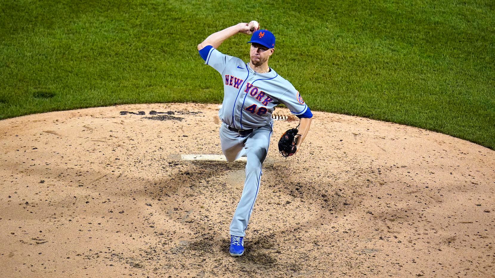 New York Mets starting pitcher Jacob deGrom delivers during the first inning of the second...