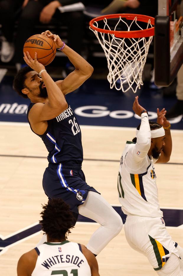 Dallas Mavericks guard Spencer Dinwiddie (26) attempts a shot in front of Utah Jazz guard...