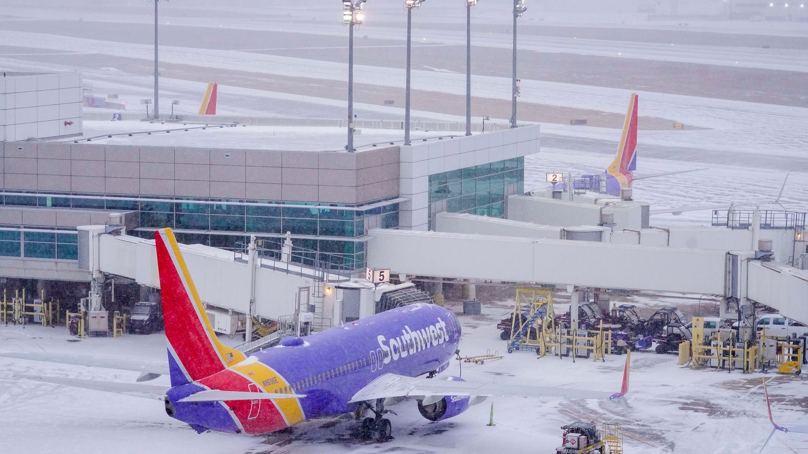 Last year's winter storm idled Southwest Airlines planes at gates at Dallas Love Field.