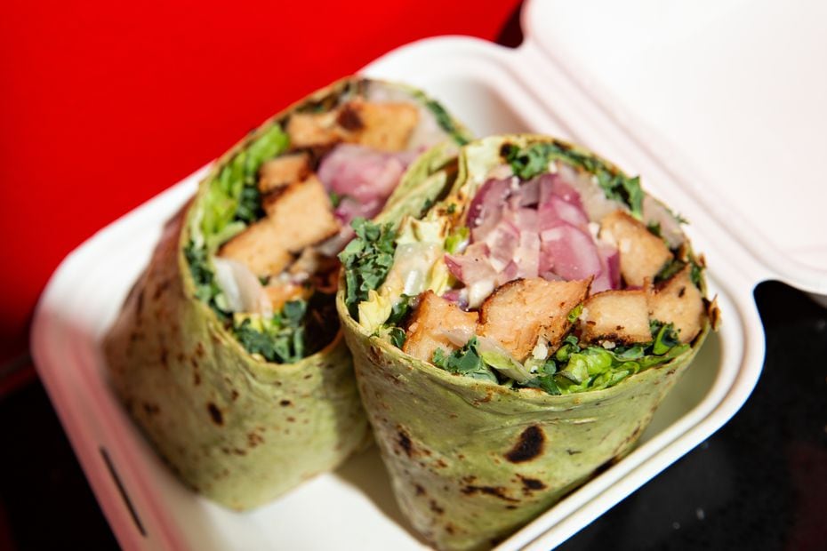 Project Pollo’s crispy "chikn" Ceasar wrap looks like a traditional chicken wrap, but it's...
