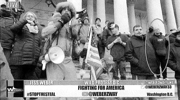 Kevin Sam Blakely, seen at right, at the U.S. Capitol during the Jan. 6 riot.