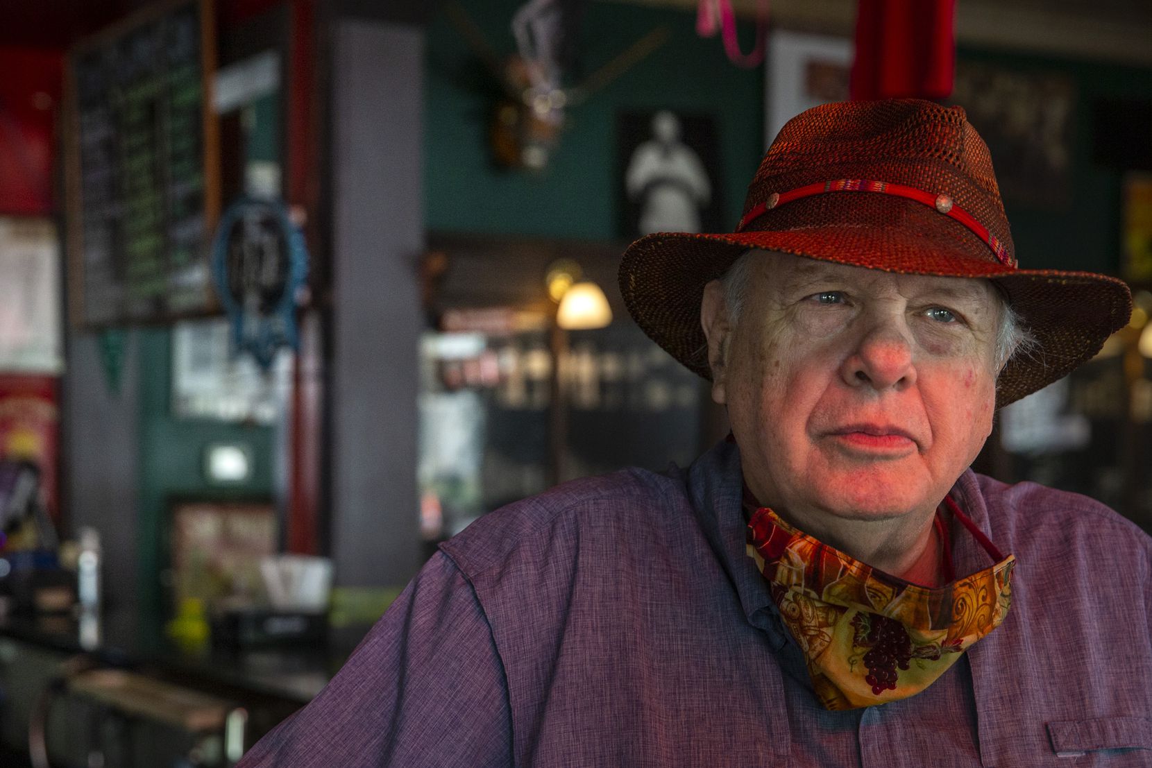 After stowing the liquor supply and closing up on Friday, owner Tom Garrison looked out the front entrance of the Stoneleigh P in Dallas' Oak Lawn area.