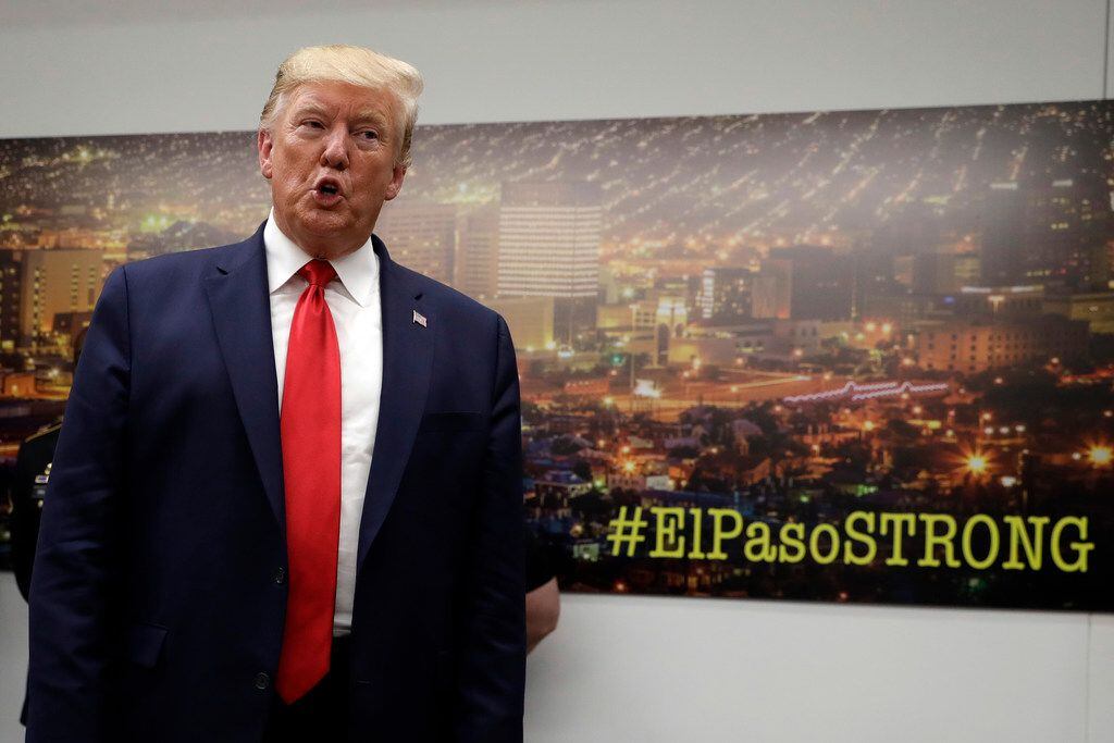 In this Aug. 7, 2019, photo, President Donald Trump speaks to the media as he visits the El...
