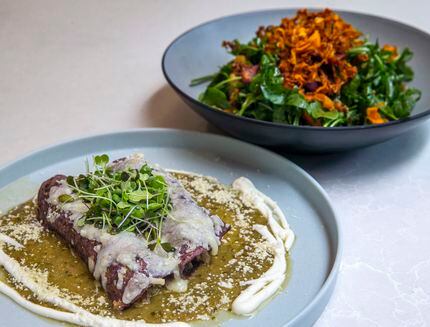 The Tipsy Chicken enchilada plate and the Arugula and Carrot Salad are two menu items at...