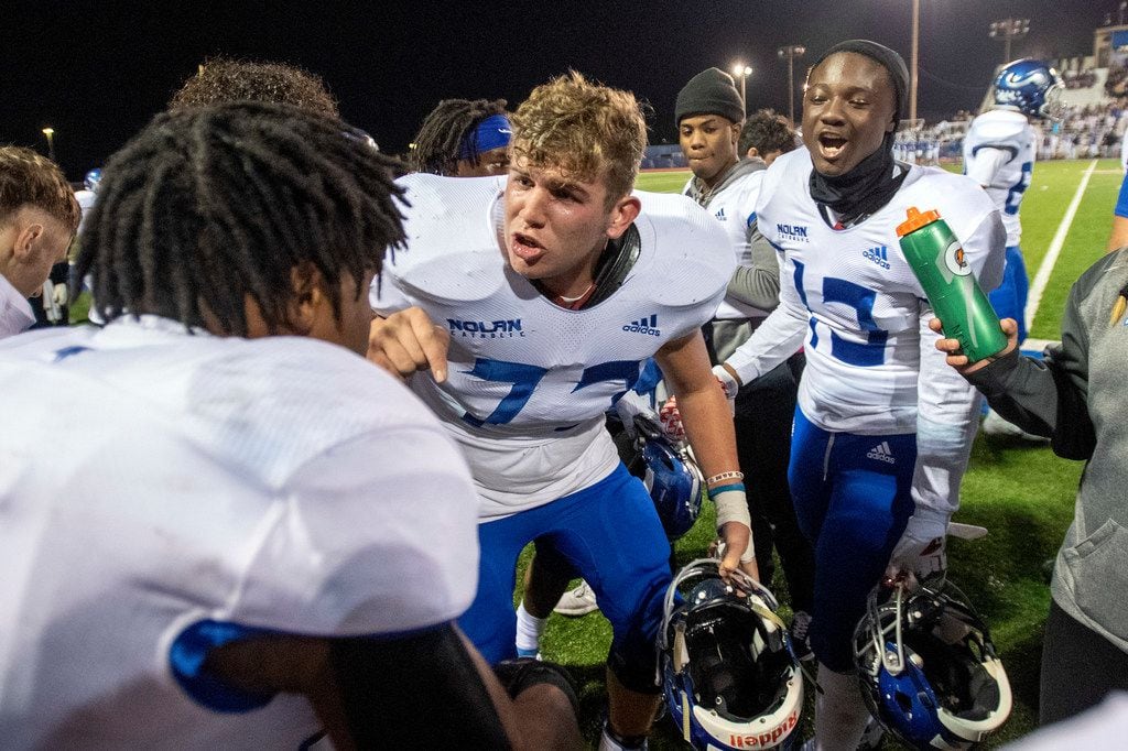 Fort Worth Nolan senior offensive lineman Sean Migliaccio (73) and sophomore linebacker Jaden Kindles (13) celebrate with sophomore running back Emeka Megwa (6) after Megwa rushed for a touchdown in the second half of a high school football game against TCA-Addison on Friday, November 8, 2019 at Tom Landry Stadium in Addison, Texas. Nolan won 27-19. (Jeffrey McWhorter/Special Contributor)