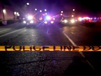 FILE - A police tape blocks a road near the scene where a Sacramento County Sheriff's deputy...
