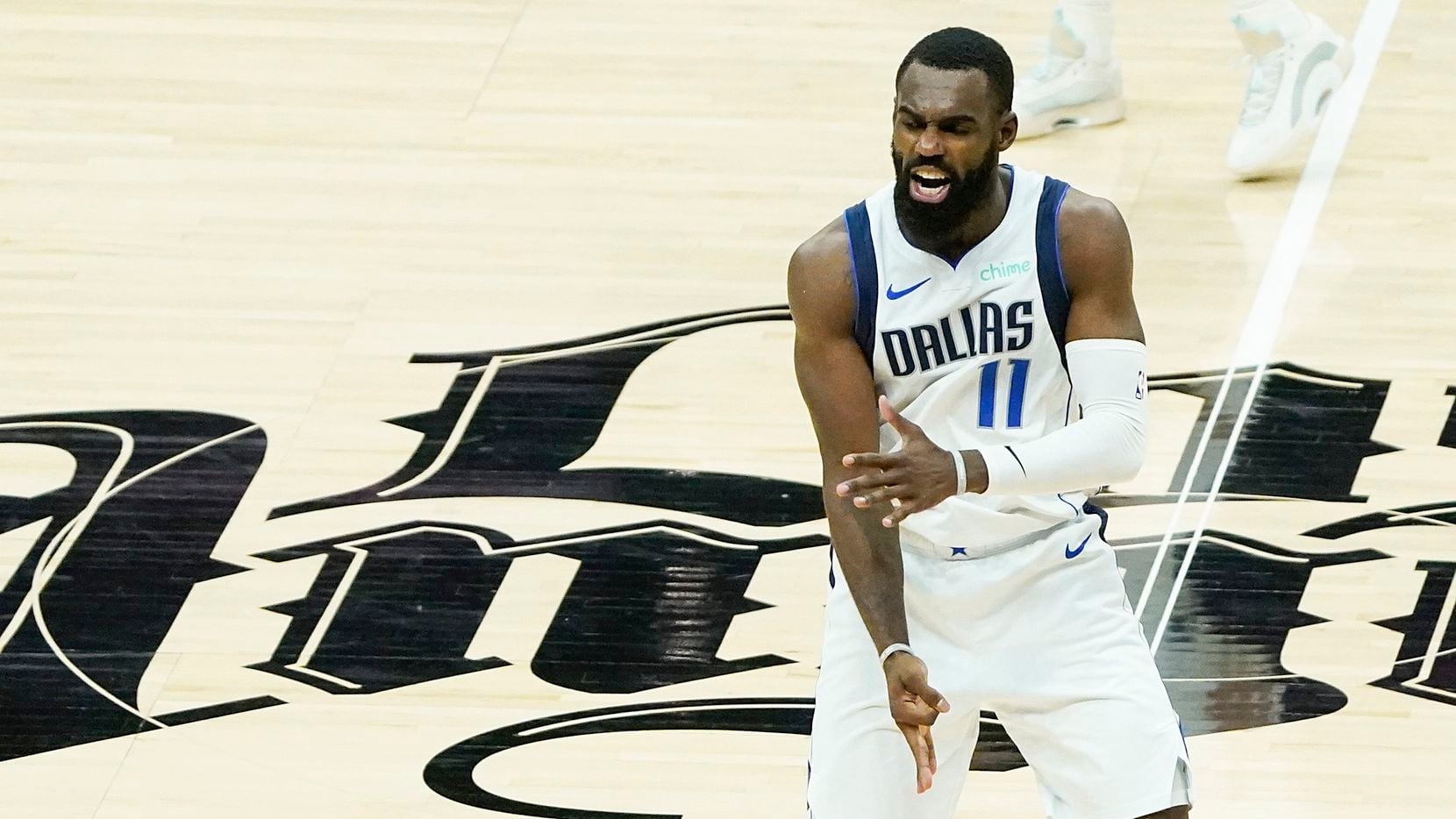 Dallas Mavericks forward Tim Hardaway Jr. (11) celebrates after hitting a 3-pointer during the third quarter of an NBA playoff basketball game against the LA Clippers at the Staples Center on Wednesday, June 2, 2021, in Los Angeles.
