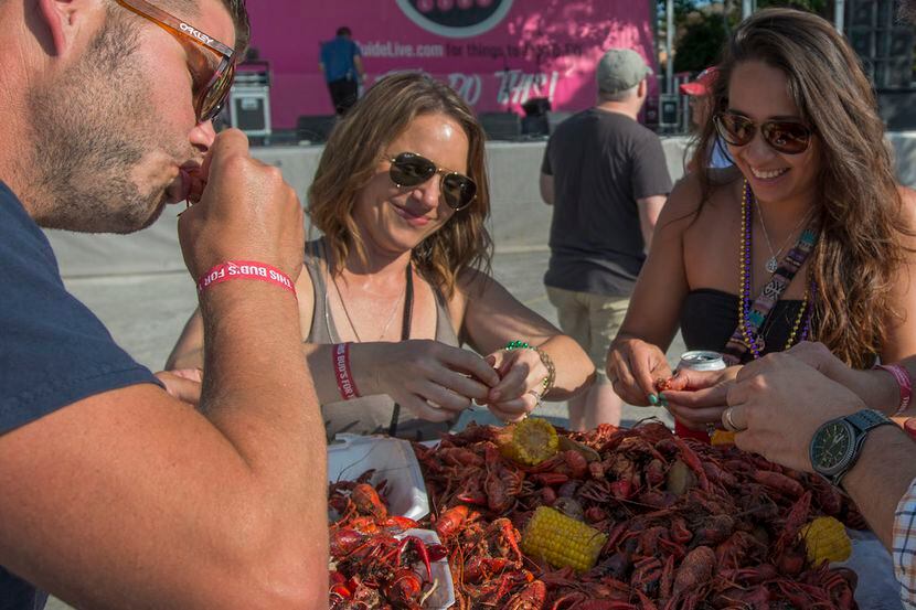Keith, Crystal, April and Jason Sawyer enjoy the crawfish at the Bugs And Brew Crawfish Boil...