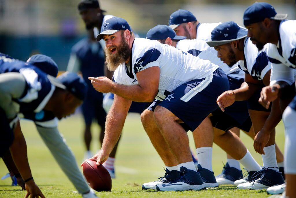 Dallas Cowboys center Travis Frederick (72) calls out the defense before snapping the ball...