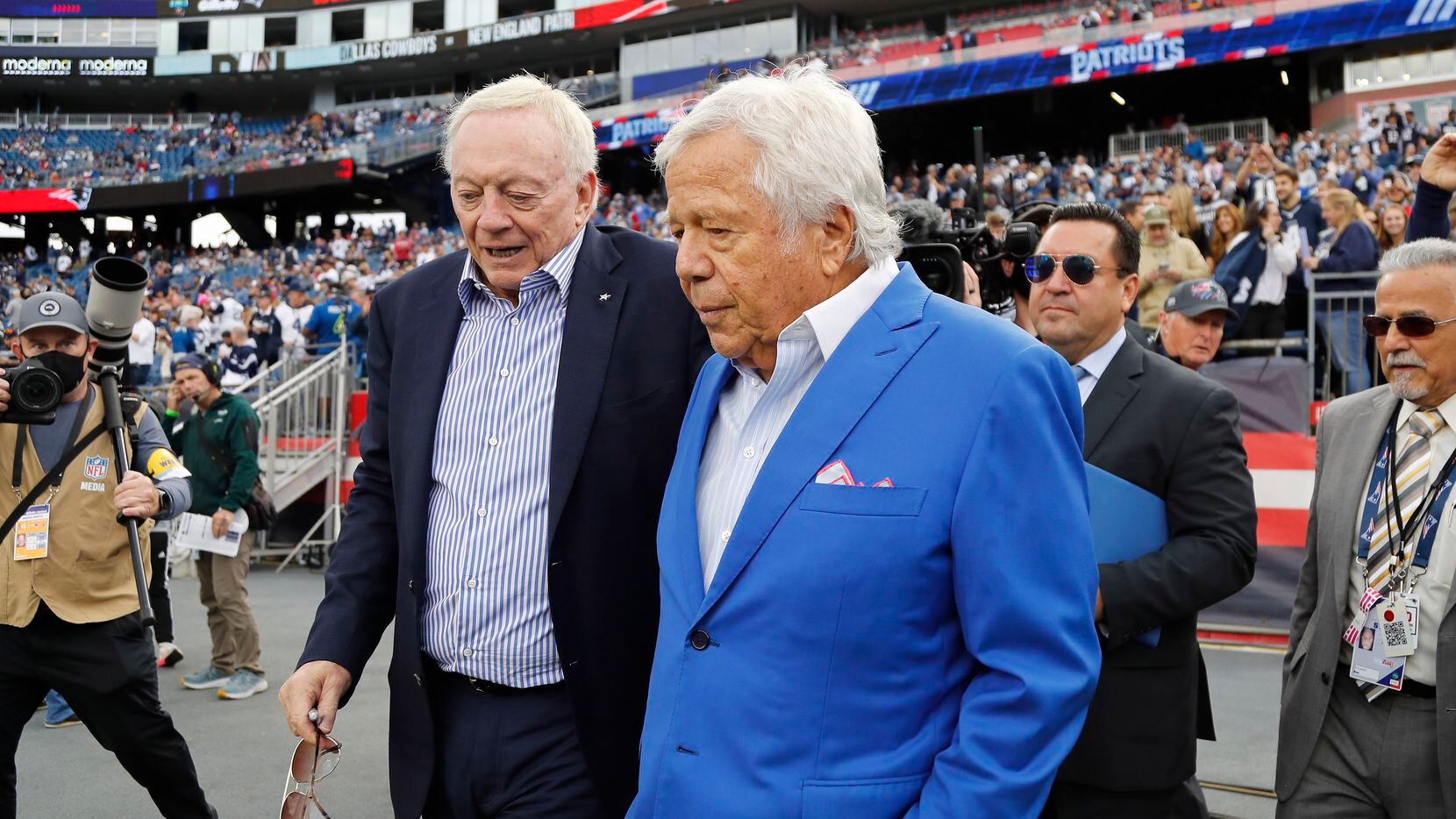 Chairman and CEO of the New England Patriots, Robert Kraft, right, talks with Jerry Jones,...