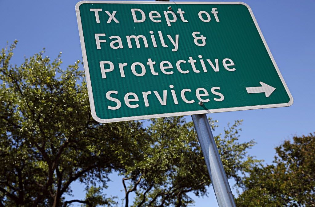A sign outside of the Texas Department of Family and Protective Services office photographed...
