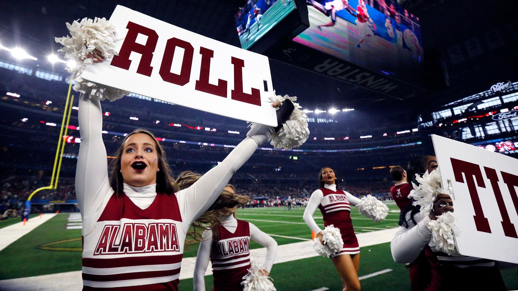 Alabama Crimson Tide cheerleaders get the crowd into the game during the second half of the...