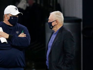 Dallas Cowboys head coach Mike McCarthy talks to Dallas Cowboys owner and general manager Jerry Jones on the sidelines in practice during training camp at the Dallas Cowboys headquarters at The Star in Frisco, Texas on Monday, August 31, 2020.