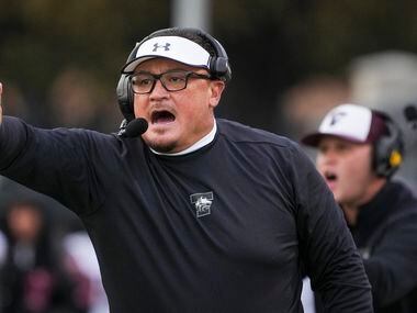 Mansfield Timberview head coach James Brown calls for a 2-point attempt after a touchdown...