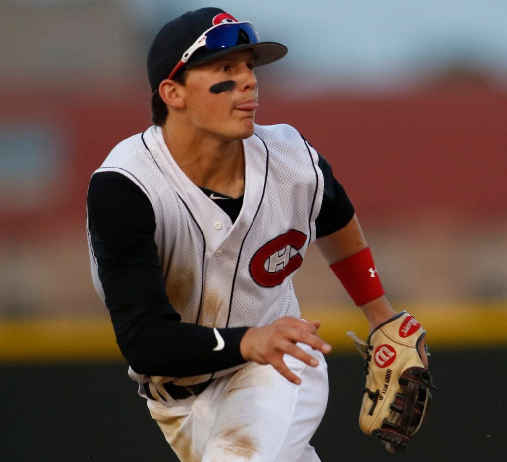 Colleyville Heritage shortstop Bobby Witt Jr. (17) reacts to the crack of the bat of a line...