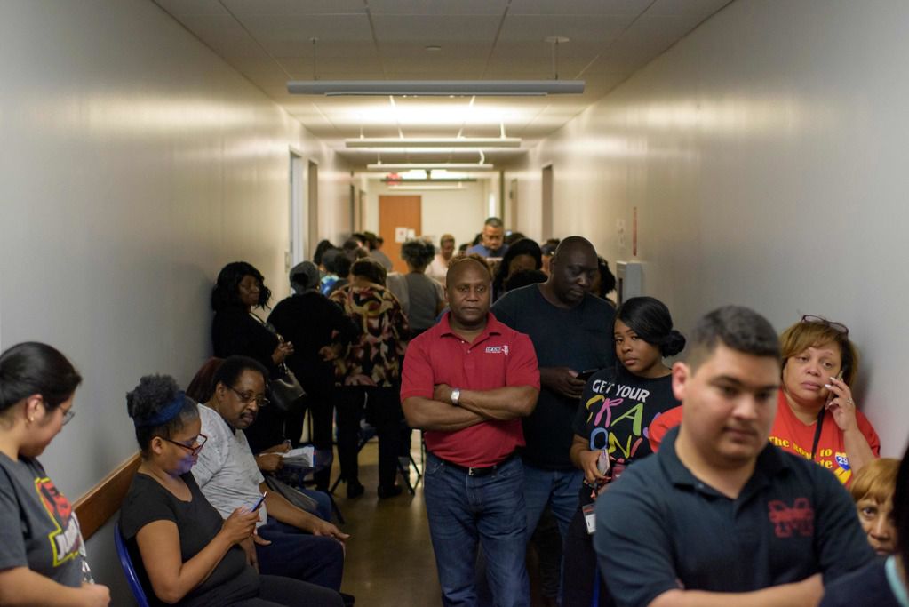 Voters line up at a polling station to cast their ballots during the presidential primary in Houston, Texas on Super Tuesday, March 3, 2020. - Fourteen states and American Samoa are holding presidential primary elections, with over 1400 delegates at stake. Americans vote Tuesday in primaries that play a major role in who will challenge Donald Trump for the presidency, a day after key endorsements dramatically boosted Joe Biden's hopes against surging leftist Bernie Sanders. The backing of Biden by three of his ex-rivals marked an unprecedented turn in a fractured, often bitter campaign. (Photo by Mark Felix / AFP) (Photo by MARK FELIX/AFP via Getty Images)