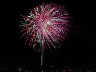 Fireworks seen over North Texas on Tuesday, July 3, 2018. (Ashley Landis/The Dallas Morning News)