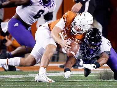 TCU Horned Frogs linebacker Shadrach Banks (19) tries to pounce on Texas Longhorns...