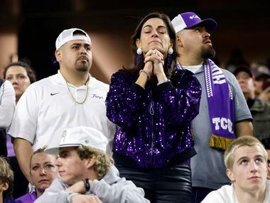 TCU Horned Frogs fans react as they trail the Georgia Bulldogs in the fourth quarter of the...