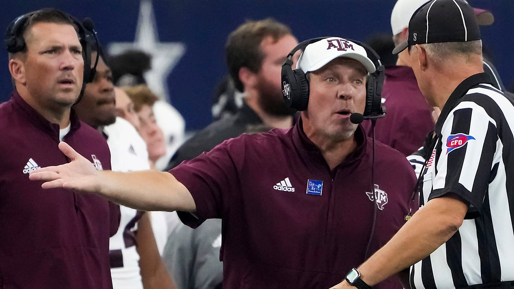 Texas A&M head coach Jimbo Fisher argues for a call during the first half of an NCAA football game against Arkansas at AT&T Stadium on Saturday, Sept. 25, 2021, in Arlington. (Smiley N. Pool/The Dallas Morning News)