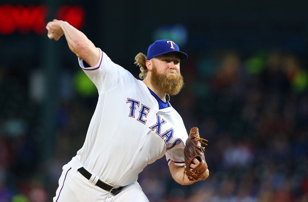 2ARLINGTON, TX - SEPTEMBER 30: Andrew Cashner #54 of the Texas Rangers in the first inning...