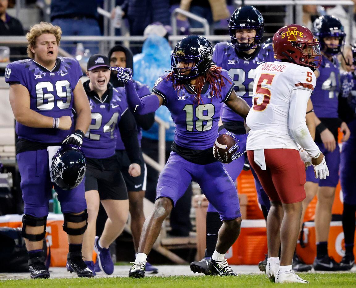 TCU Horned Frogs wide receiver Savion Williams (18) signals first down after catching a long...