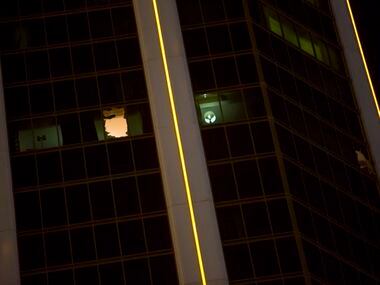 Broken windows in a 32nd-floor suite at the Mandalay Bay Resort and Casino, from which a...