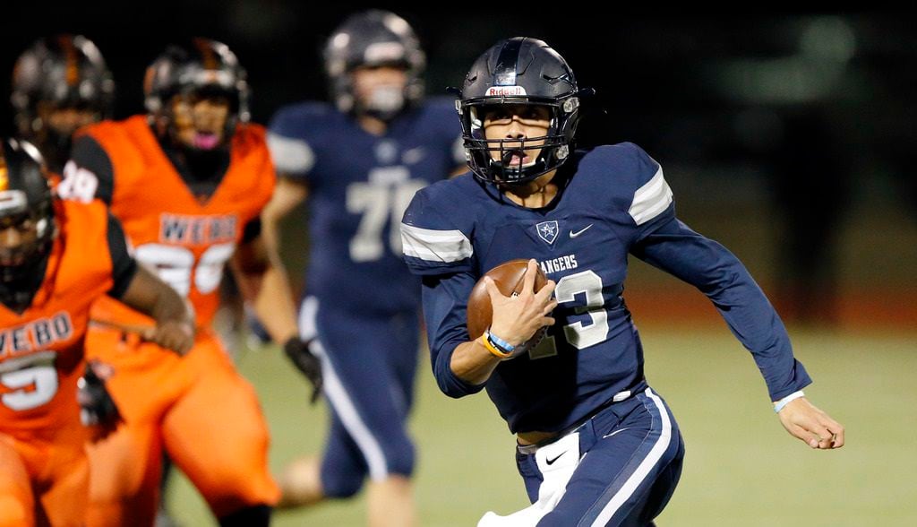 Frisco Lone Star quarterback Garrett Rangel (13) carries the ball against Lancaster during the first half of their Class 5A Division I Regional championship game at Wilkerson-Sanders Stadium in Rockwall, Texas, Friday, December 6, 2019. (Tom Fox/The Dallas Morning News)