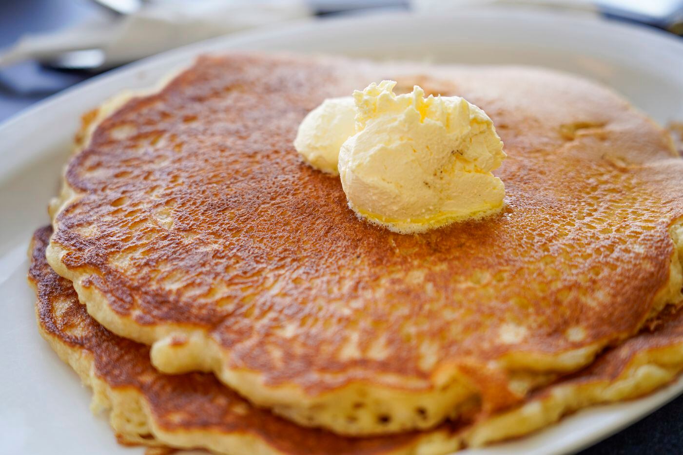 A plate of pancakes at Jack's Airport Cafe are a popular order. Owner Jack Pyland, 75, has...