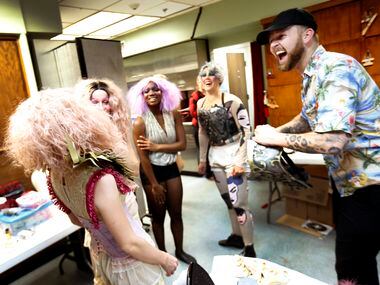 Costume designer Victor Brockwell (right) and members of the Pippin cast share a laugh...