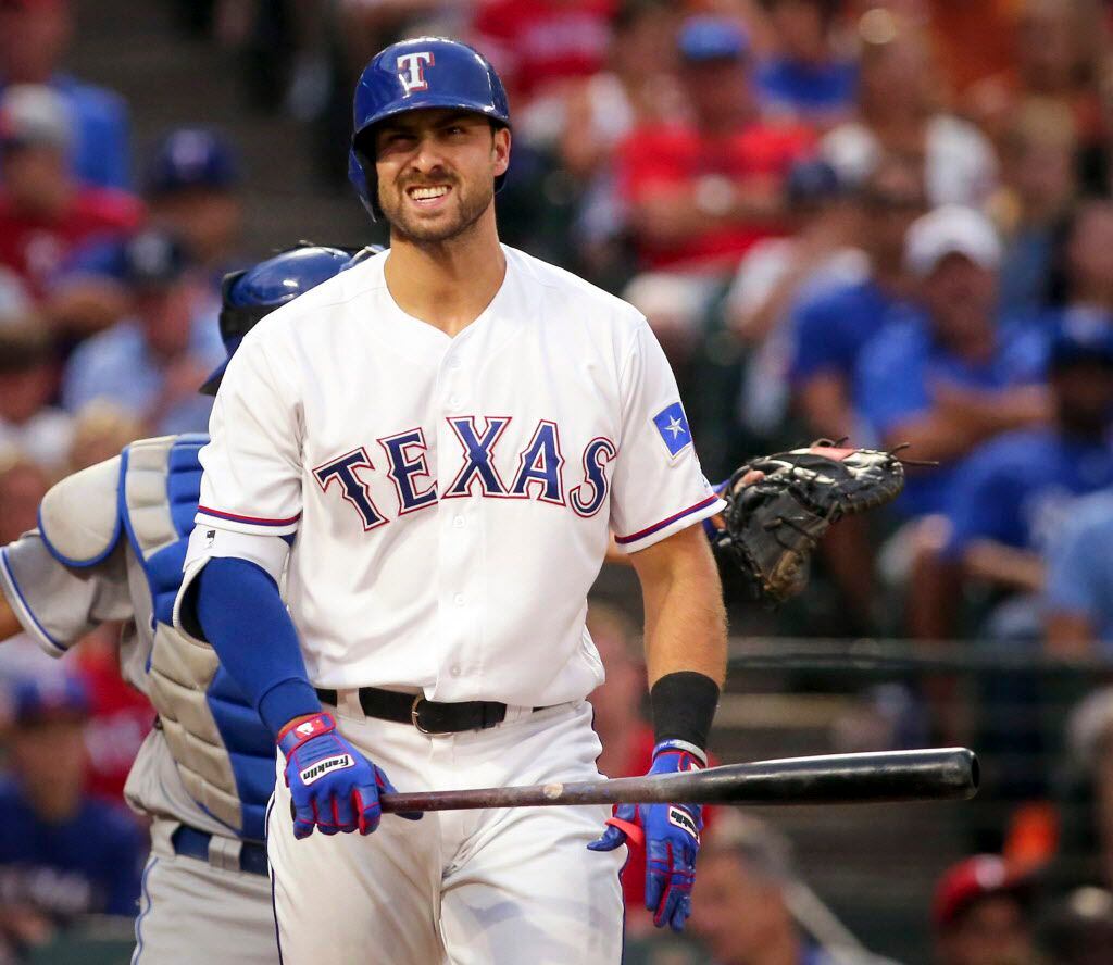 Texas Rangers designated hitter Joey Gallo reacts after striking out in the second inning...