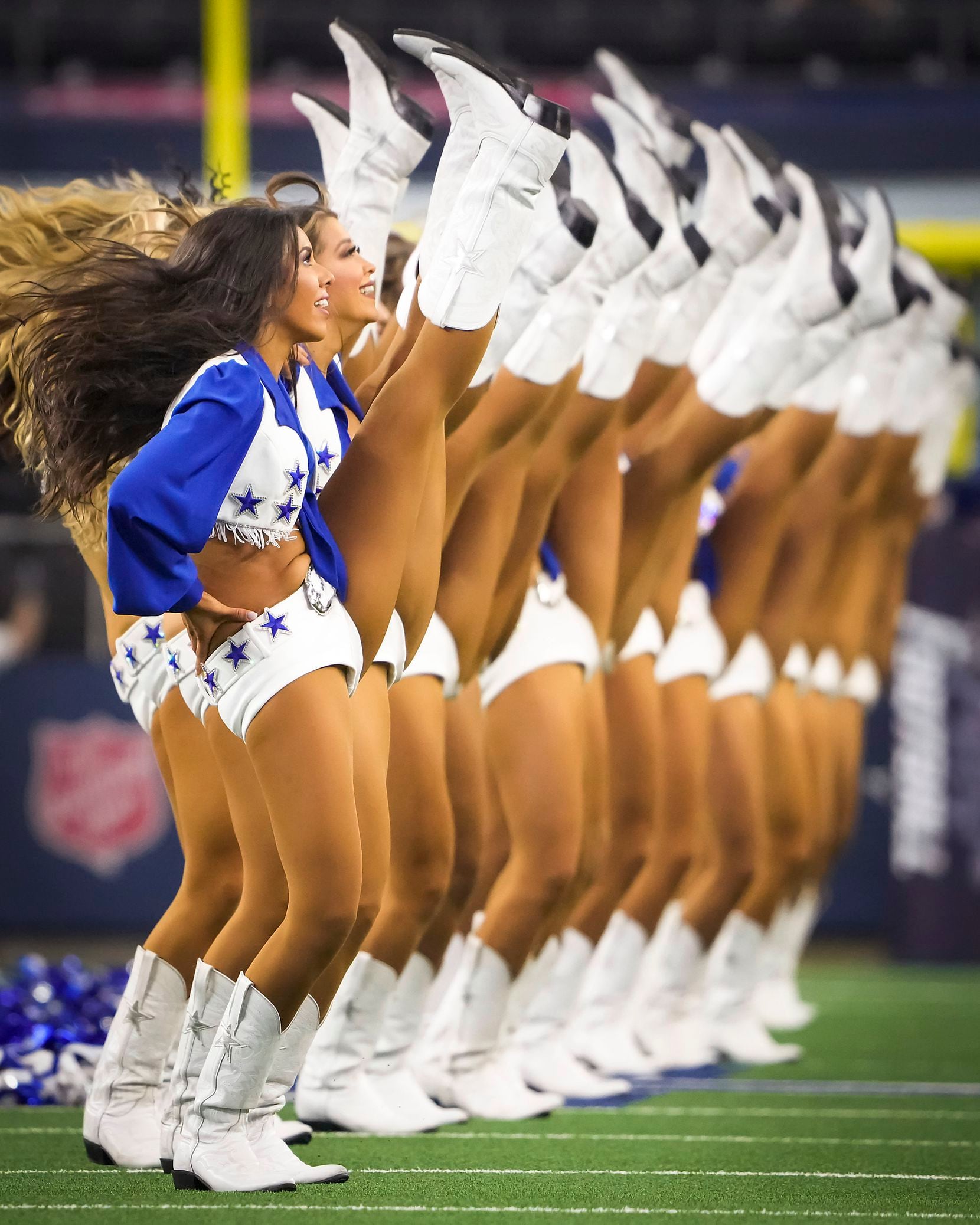 The Dallas Cowboys Cheerleaders perform before a preseason NFL football game against the...