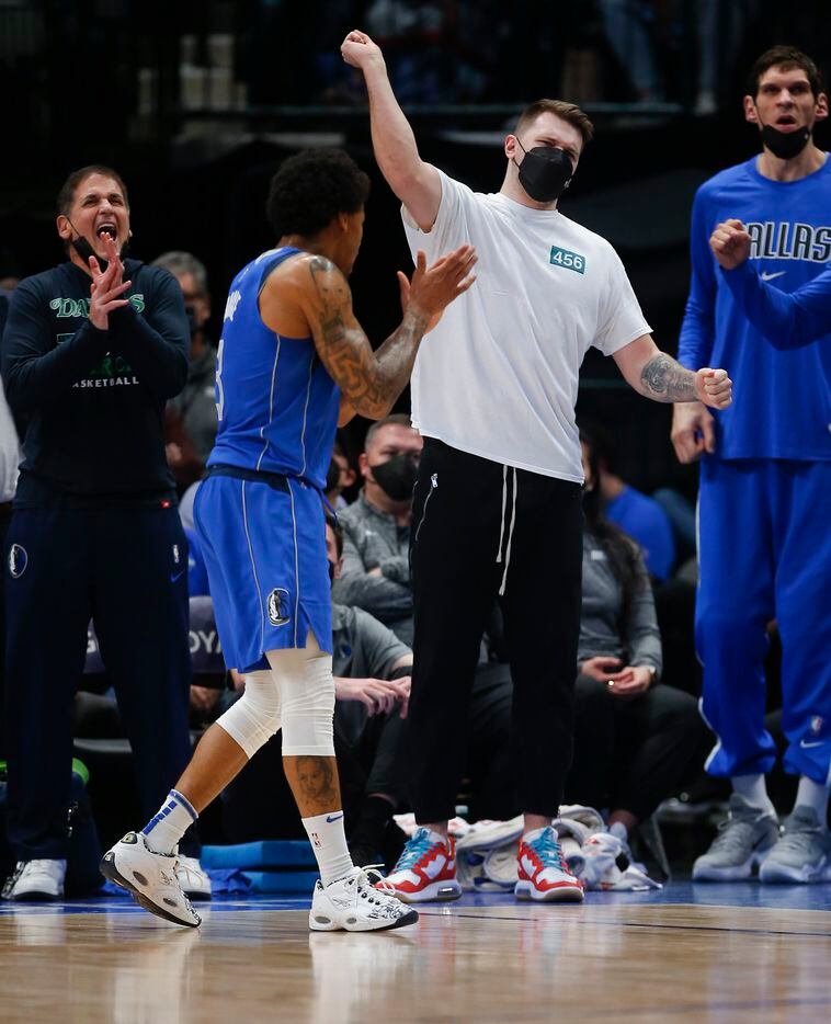 Dallas Mavericks guard Luka Doncic, ankle injury, cheers on his teammates from the bench during the second half of an NBA basketball game against the Charlotte Hornets in Dallas, Monday, December 13, 2021. Dallas won 120-96. (Brandon Wade/Special Contributor)