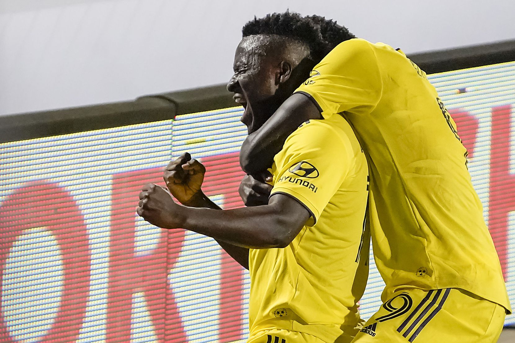 Nashville SC forward David Accam (11) celebrates with forward Dominique Badji (9) after scoring during the 86th minute of a 1-0 victory over FC Dallas in an MLS soccer game at Toyota Stadium on Wednesday, Aug. 12, 2020, in Frisco, Texas. (Smiley N. Pool/The Dallas Morning News)