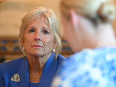 First Lady Jill Biden listens to Dr. Austin Dennard of Dallas during a conversation at the...