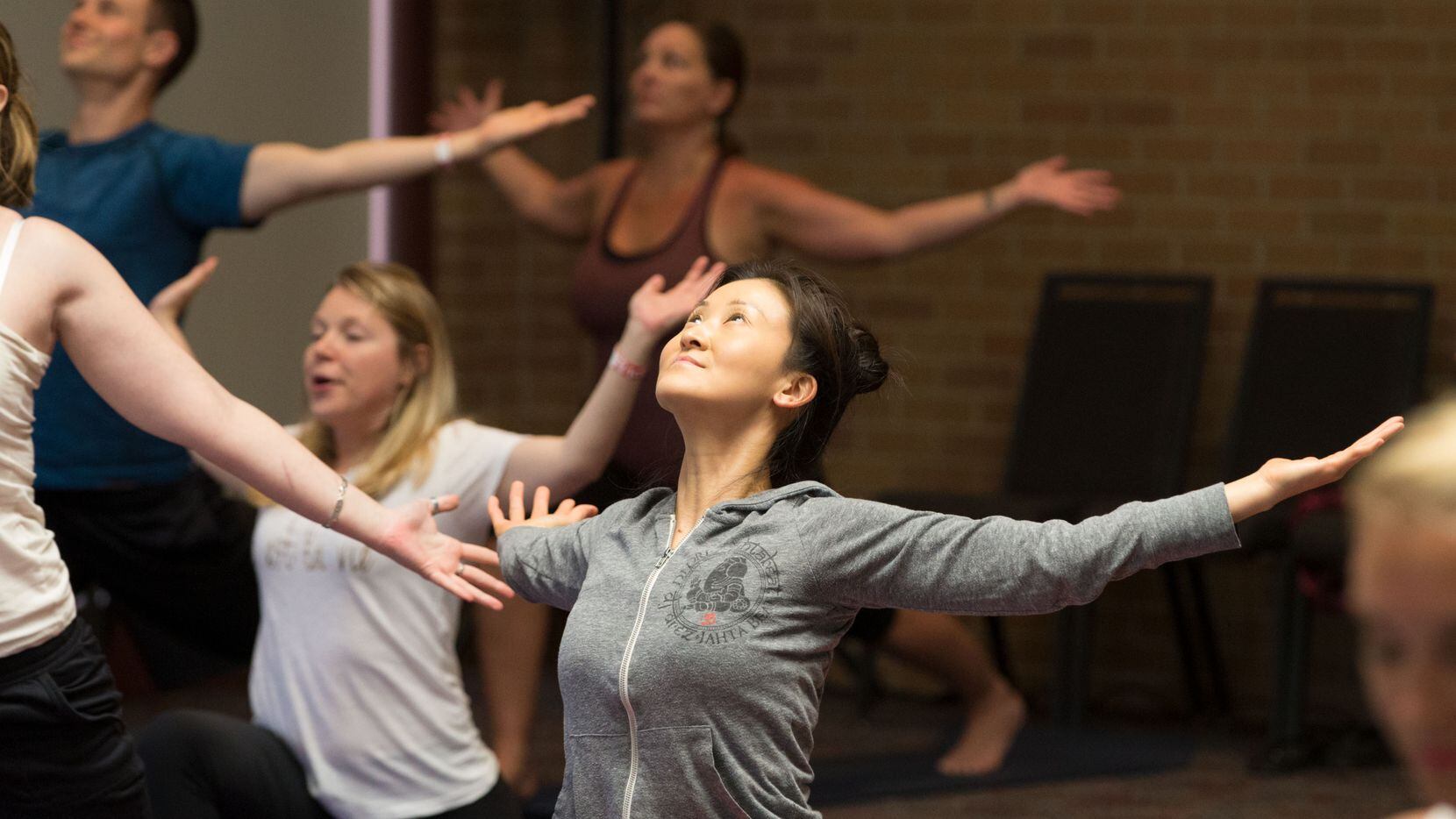 Linda Chou of Plano attended a yoga session led by psychotherapist and yoga instructor Thom...