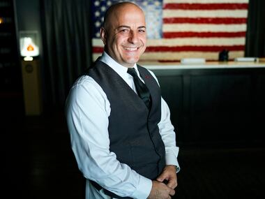 Server Benny Bajrami at Nick & Sam's restaurant on Saturday, April 1, 2023, in Dallas. 
