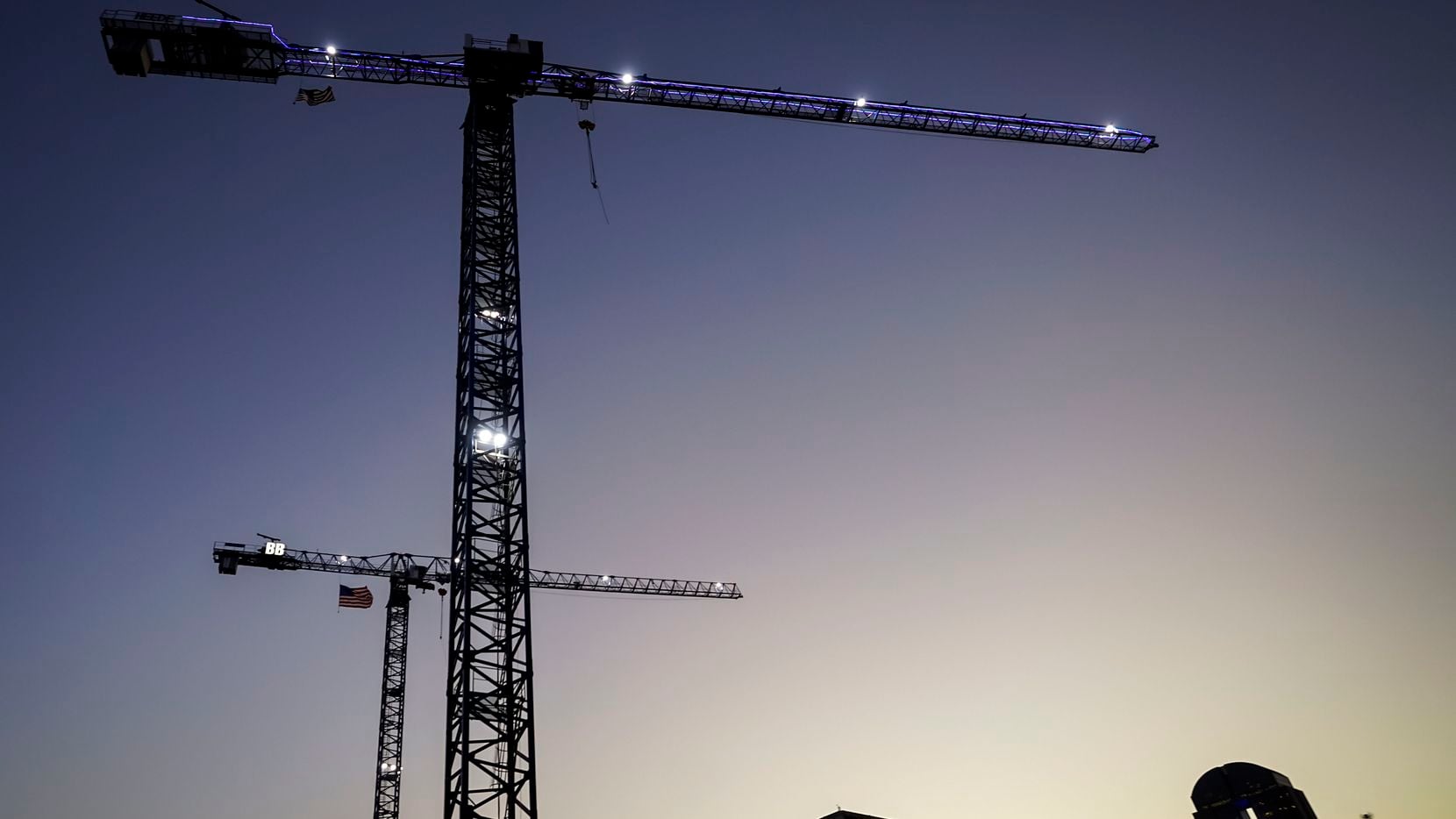 Construction cranes poised for work in August 2020 in Deep Ellum. Too often the city's...