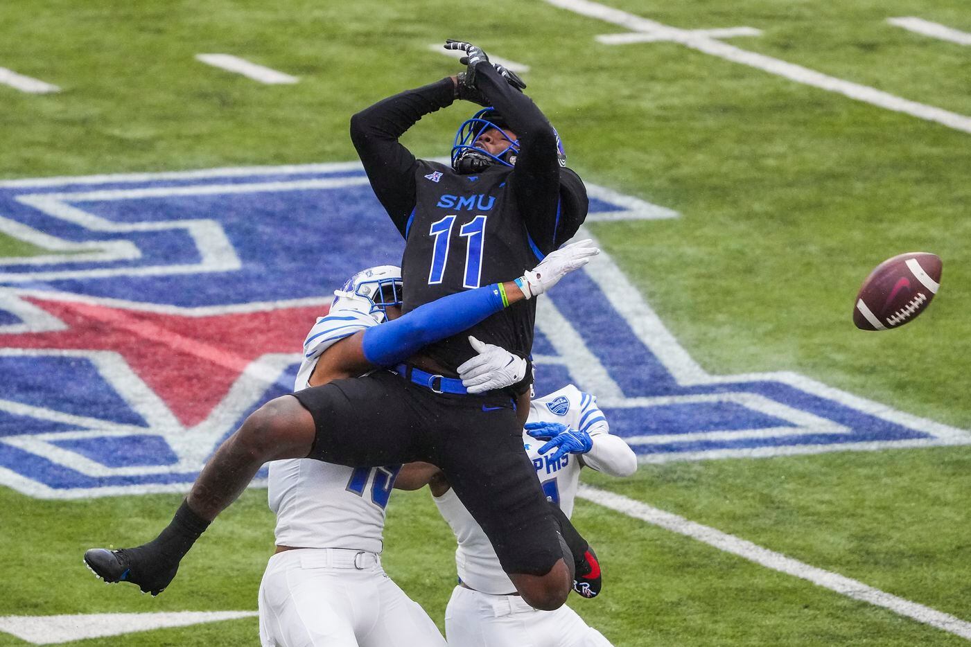 SMU wide receiver Rashee Rice (11) can’t hold on to a pass as Memphis defensive back...