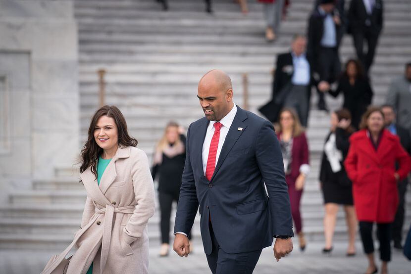 Democrats Abby Finkenauer of Iowa and Colin Allred of Texas head to a group photo for...